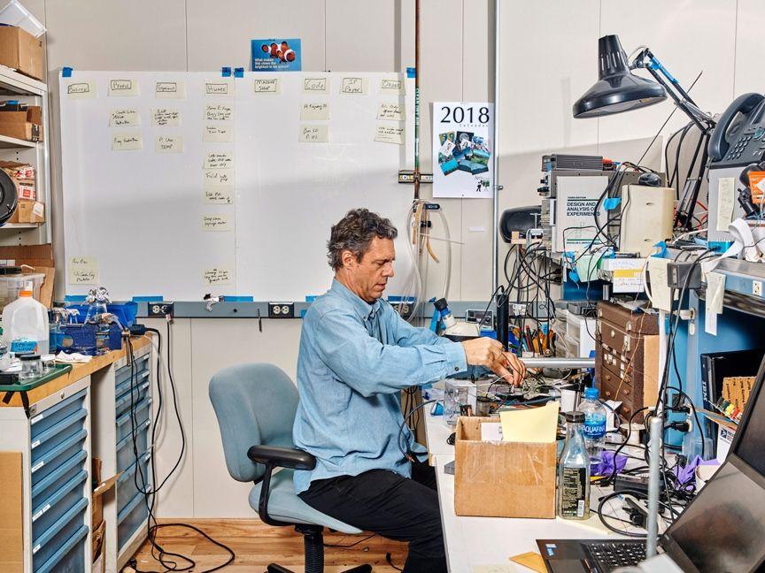 person at engineering work bench